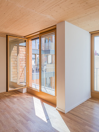 Photo of an interior with CLT wooden ceiling and walls