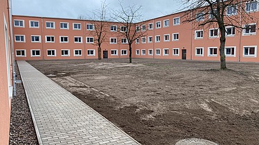Photo of the inner courtyard of the police school, Meiningen. 