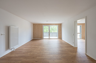 Modular construction MOLENO. Joseph Foundation project in Bayreuth Photo of an empty interior with white walls and LENO ADD exterior walls. Built with the MOLENO concept.