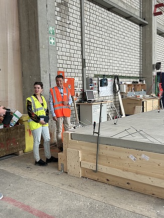 Three people in the ZÜBLIN Timber production hall