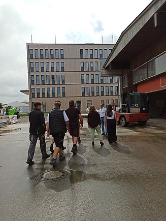 Photo of new talents receiving a tour of the ZÜBLIN Timber plant.