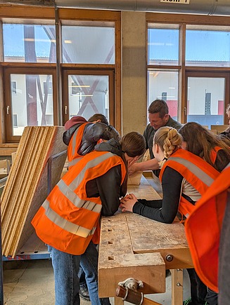 Building the birdhouses in the factory.