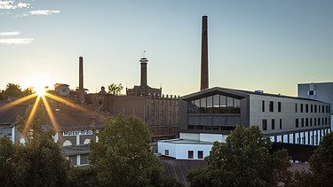 Photo of the Maisel Bros. brewery in Bayreuth. You can see the wooden extension from a distance.