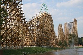 Photo of a roller coaster with wooden rails.