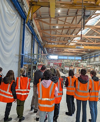 The girls on a production tour of the plant.