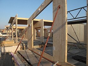 Photo of an assembly of LENO cross-laminated timber elements. Wooden extension.