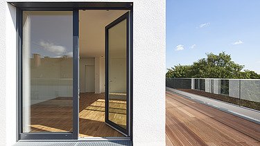 Foto eines Terrassenausschnittes einer Aufstockung mit Flachdach.