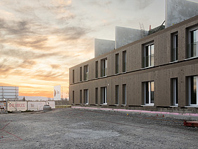 Außenansicht des Holz-Hybrid-Baus Quartier Hangweide in Kernen.