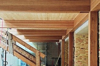 LENO-KIT from ZÜBLIN Timber. Poplar avenue Berlin Photo of a timber construction site. You can see BauBuche beams.