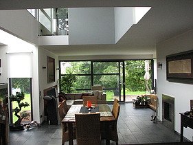 Photo of a modern dining room. House with LENO cross-laminated timber elements.