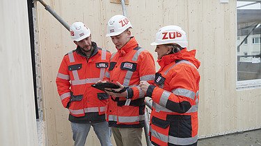 Michael at a meeting with colleagues. 