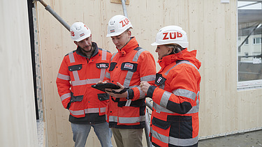 Michael at a meeting with colleagues. 