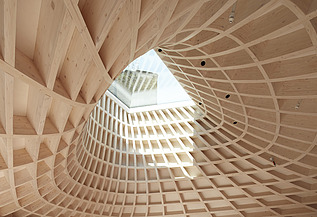 Photo of a wooden structure or a wooden ceiling with a window hole in the middle