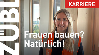 Foto einer jungen Bauleiterein im Rohbau des Büroneubaus T3 von ZÜBLIN Timber.