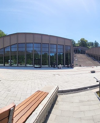 The complex comprises three separate buildings, separated from one another by a grand open staircase. 