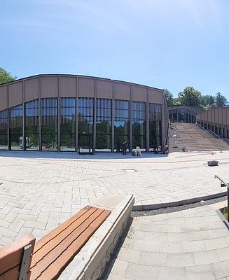The complex comprises three separate buildings, separated from one another by a grand open staircase. 