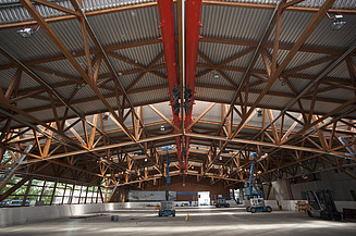 Additions, building in existing buildings Photo of a commercial building with wooden roof construction