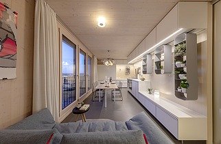 Photo of the SKAIO Stadtsiedlung building in Heilbronn. You can see a furnished living space.