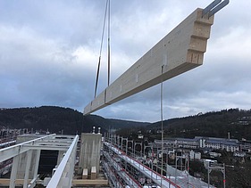 Photo of a BSH beam during assembly. Project: Calw District Office.