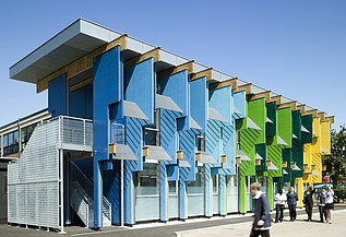 Community School, Longford Photo of a school building with colorful façade elements made of laminated veneer lumber.