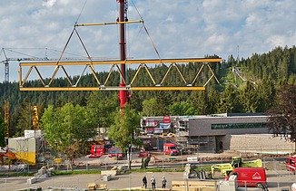 Photo of the visitor center in Ruhestein, large wooden element on the crane.