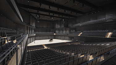 Photo of the interim venue Gasteig in Munich. You can see the black acoustic walls in the stage area.