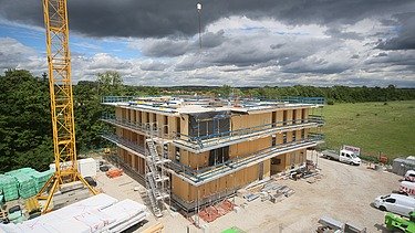 Photo of a multi-storey timber building during assembly.