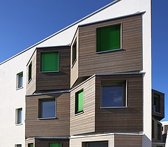 Photo extract of the facade Adlershof Berlin. You can see wooden bay windows.