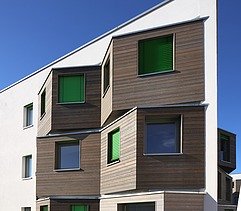 Photo extract of the facade Adlershof Berlin. You can see wooden bay windows.