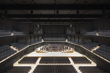 Interim venue Gasteig Munich Photo of the interim venue Gasteig in Munich. You can see the seated stage area with orchestra.