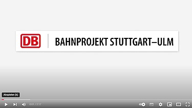 Photo of a screen with the inscription DB Bahnprojekt Stuttgart-Ulm.