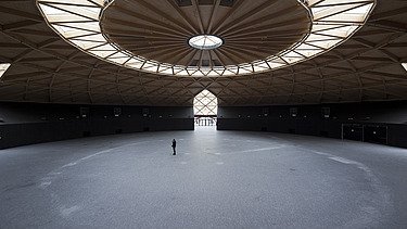 Photo of Las Arenas in Barcelona. The wooden dome with glass elements can be seen from the inside.