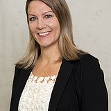 Foto einer lachenden Frau. Susanne Hörmann