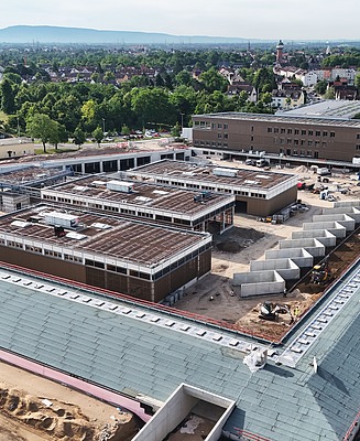 The complex consists of a main building with office space and workshops.  
