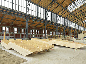 Photo of wooden stairs shortly before assembly begins. Gare Maritime Brussels