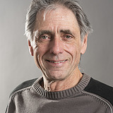 Contact Helmut Rehm from ZÜBLIN Timber Photo of a man with grayish hair in a brown sweater with black shoulder stripes. Helmut Rehm.