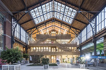 Gare Maritime Brussels Photo of the hall of the Gare Maritime Brussels. Huge, open hall space with wooden roof construction.