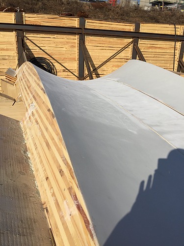 Photo of a detail on the Stuttgart21 construction site. You can see a special formwork element, or LENO cross-laminated timber element, lying on the construction site.