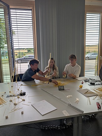 Photo of some trainees playing a game to get to know each other. 