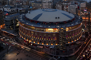 Night shot of Las Arenas in Barcelona from outside.