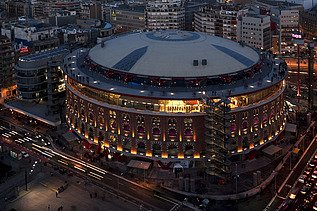 Night shot of Las Arenas in Barcelona from outside.