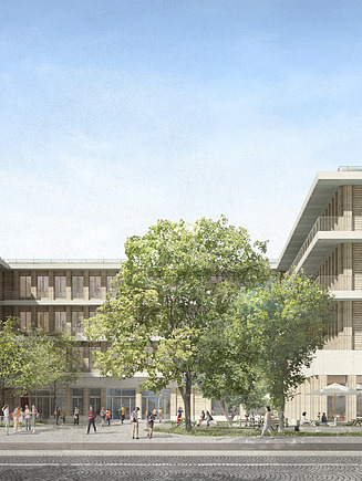 Außenansicht der Schule mit einer Holz-Fassadenverkleidung.