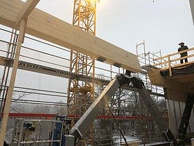 Photo of a BSH beam during assembly. Project: Calw District Office.