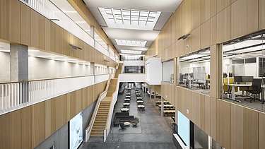 Photo of a large interior with many wooden surfaces.