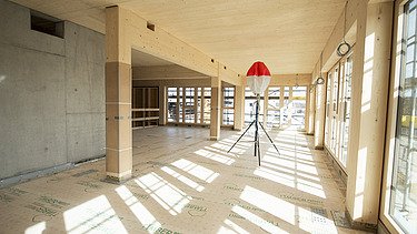 Shell construction photo of the ZÜBLIN Timber office building. Canteen.