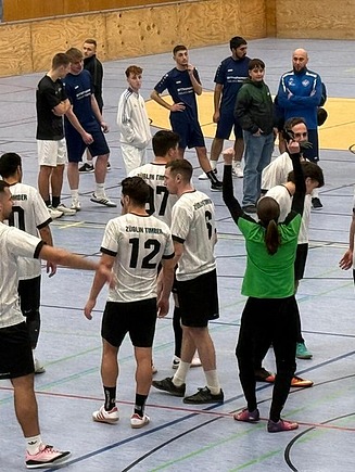 Photo of a hobby soccer team in a sports hall.