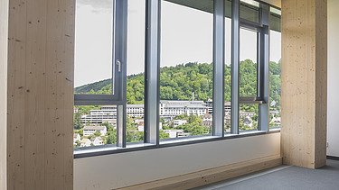 Photo of an interior window section. Glulam supports can be seen.