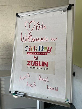 Photo of a sign with the words: Welcome to Girls Day at ZÜBLIN Timber