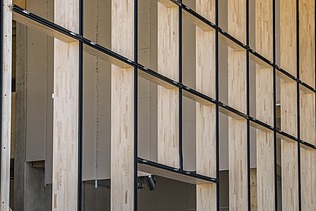 Photo of the wooden façade of the JOWAT Haus der Technik building.
