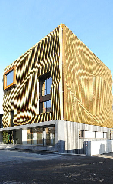 Office building Lignoalp Brixen Photo of the Lignoalp office building in Brixen. Modern building with wooden façade.